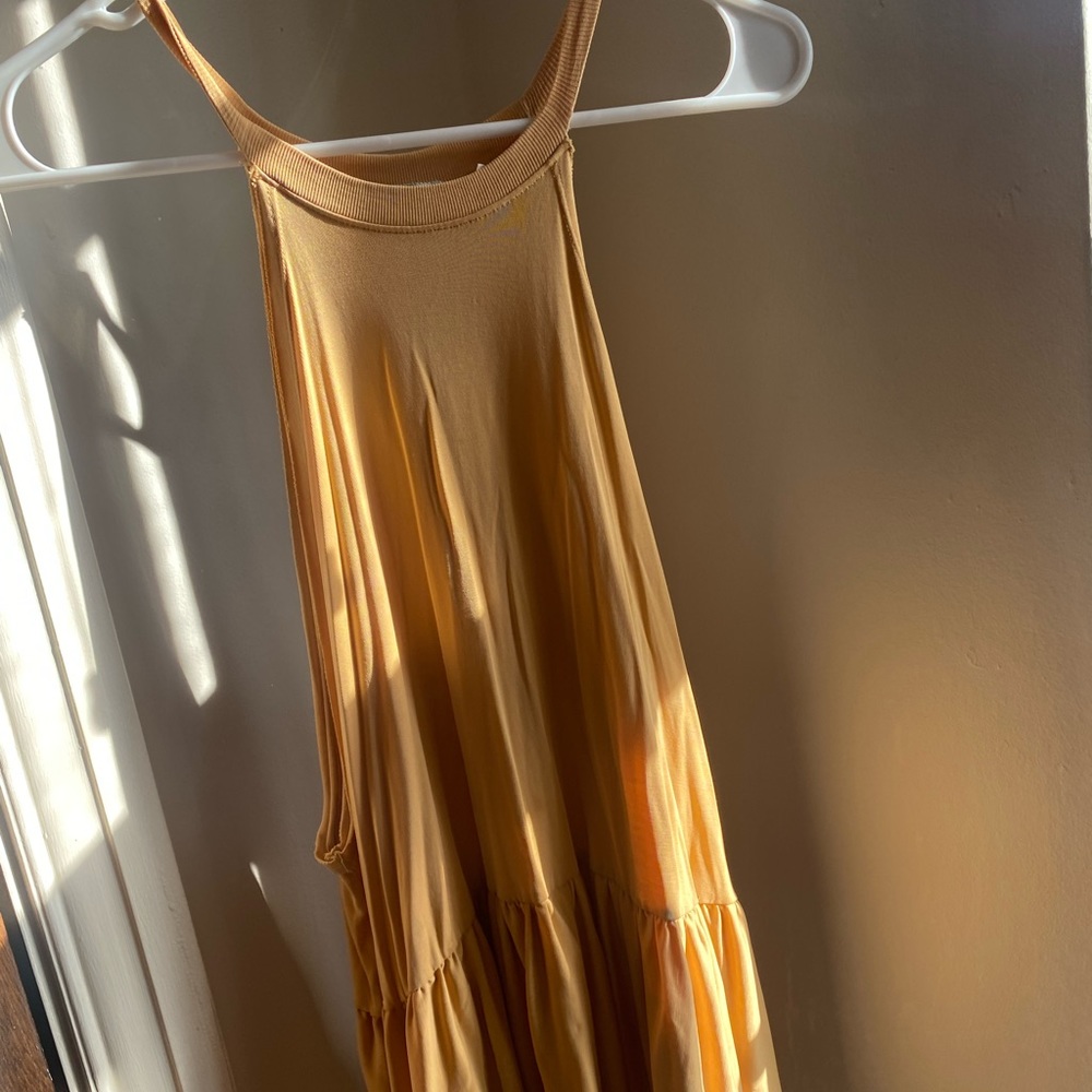 Longline, high neck tank in mustard yellow